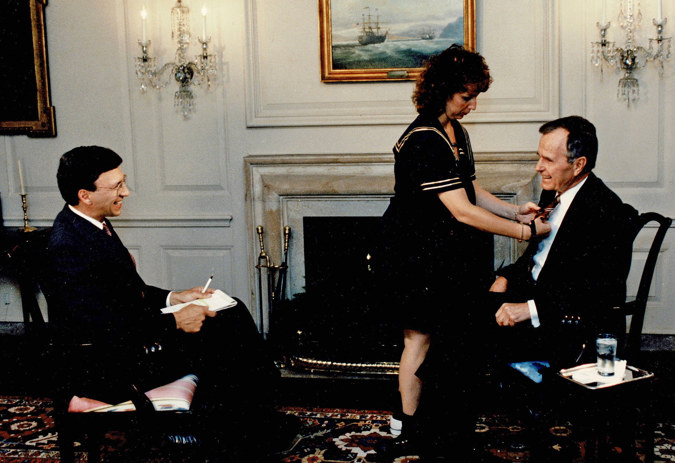 Sesno and then-President George H.W. Bush get set up for an interview at the White House for CNN.